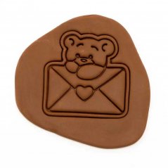Teddy mackó egy levél | alakú kiszúró forma